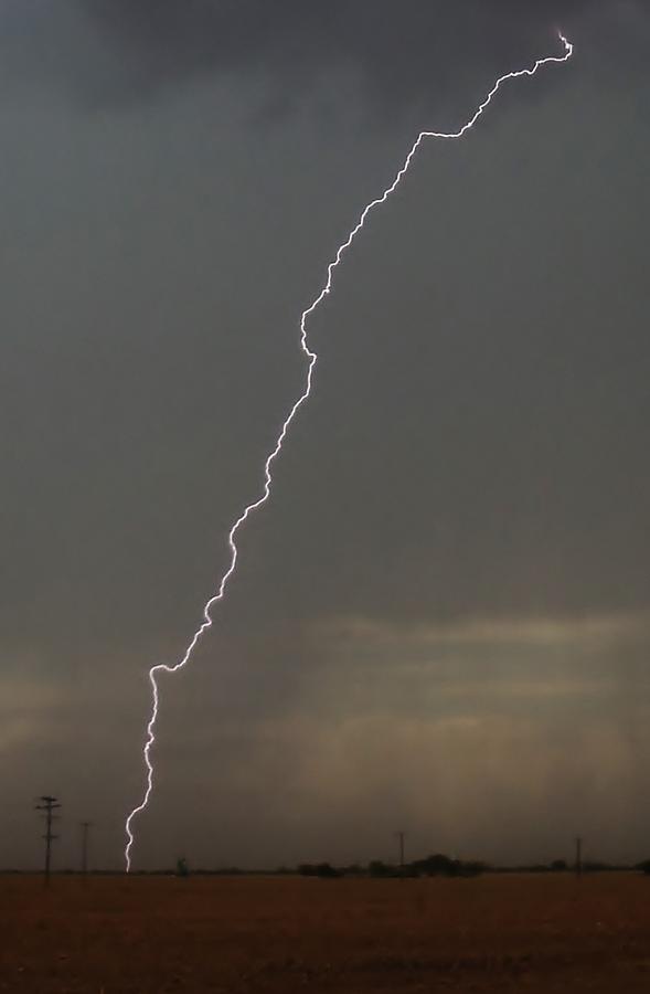 Lightning Strike in Texas Photograph by Ed Sweeney