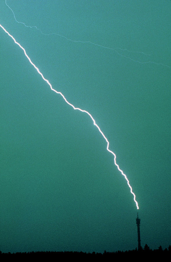 Lightning Striking A Telecommunications Tower Photograph by Pekka Parviainen/science Photo Library