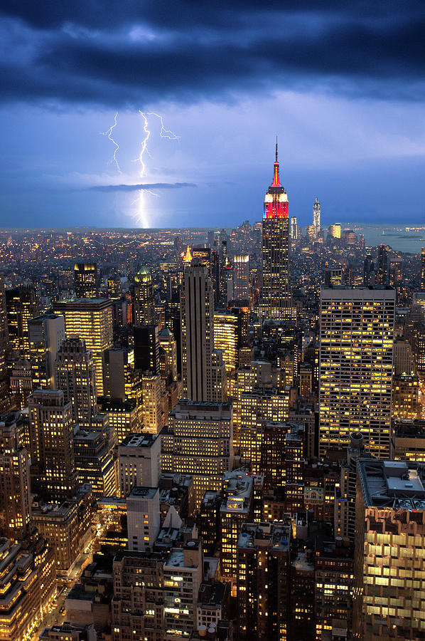 Lightning Striking Over Manhattan Photograph by Mike Hill