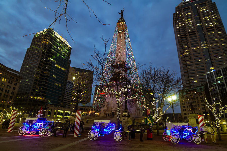 Lights and Carriage Rides Photograph by Ron Pate