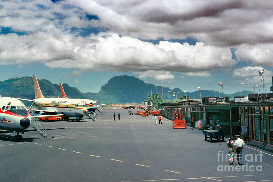 Transportation Photograph - Lihue Airport with Cumulus Clouds in Kauai Hawaii  by Wernher Krutein