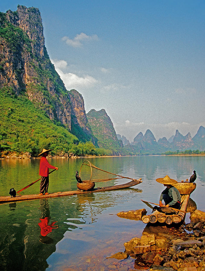 Lijiang fishing rafts Photograph by Dennis Cox
