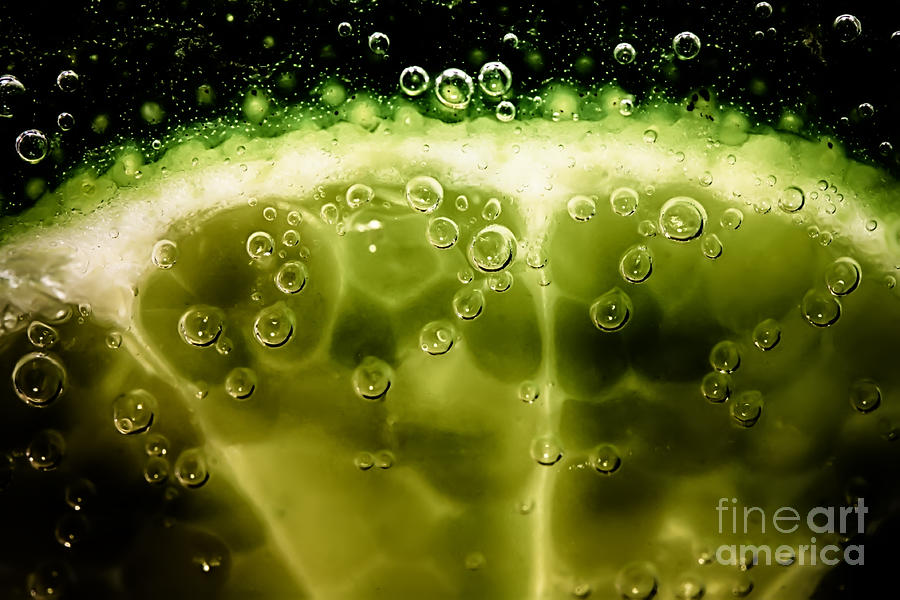 Juice Photograph - A Slice In Lime by Simon Bratt