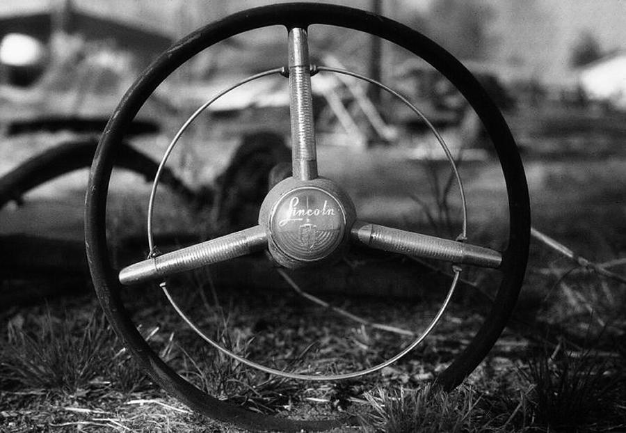 Black And White Photograph - Lincoln Wheel by Steven Loyd