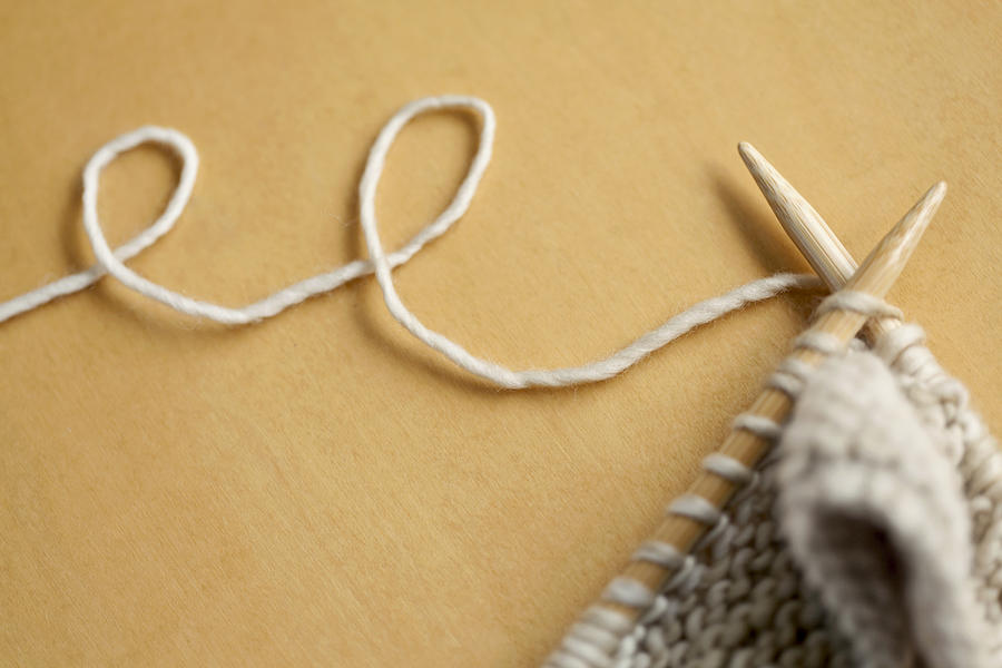 Line Of Wool String Connected To Knitting Project Photograph by Siri Stafford