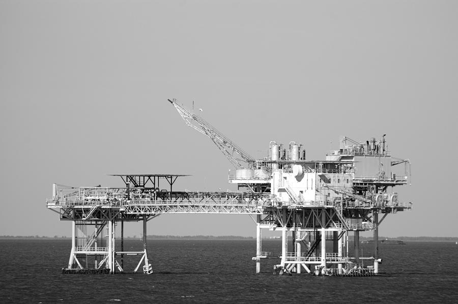 Linked oil platforms B and W Photograph by Bradford Martin