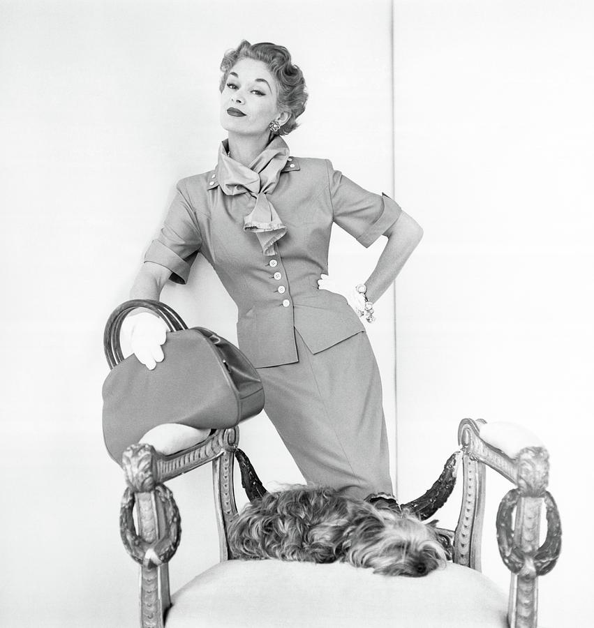 Lisa Fonssagrives Wearing Suit By Dog Photograph by Horst P. Horst