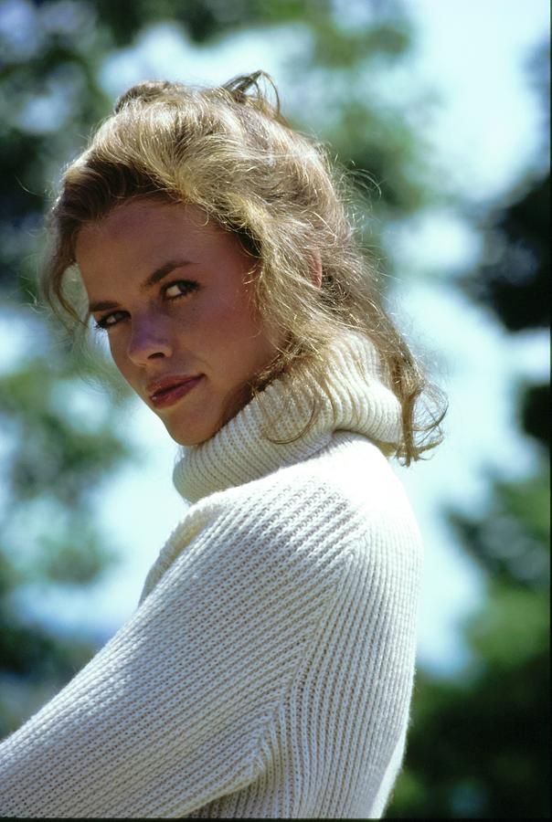 Lisa Taylor Wearing A White Turtleneck Photograph by Arthur Elgort