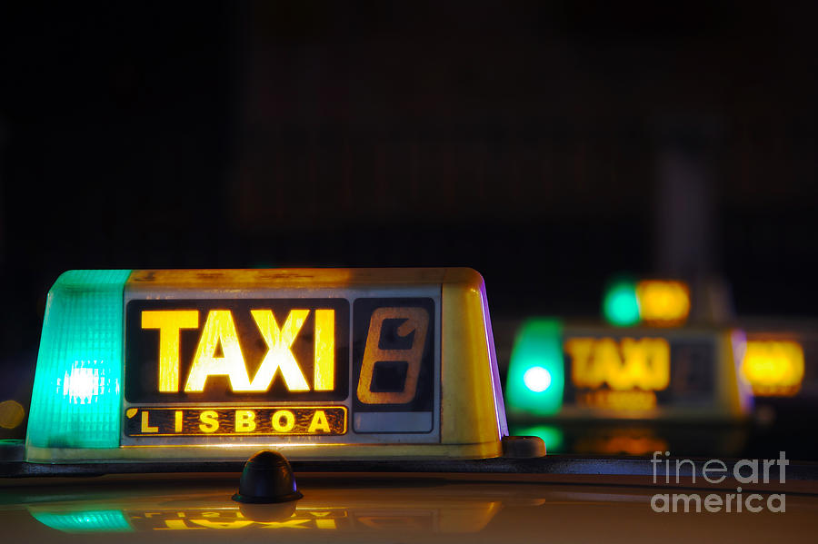 Lisbon Taxi Sign Photograph by Carlos Caetano