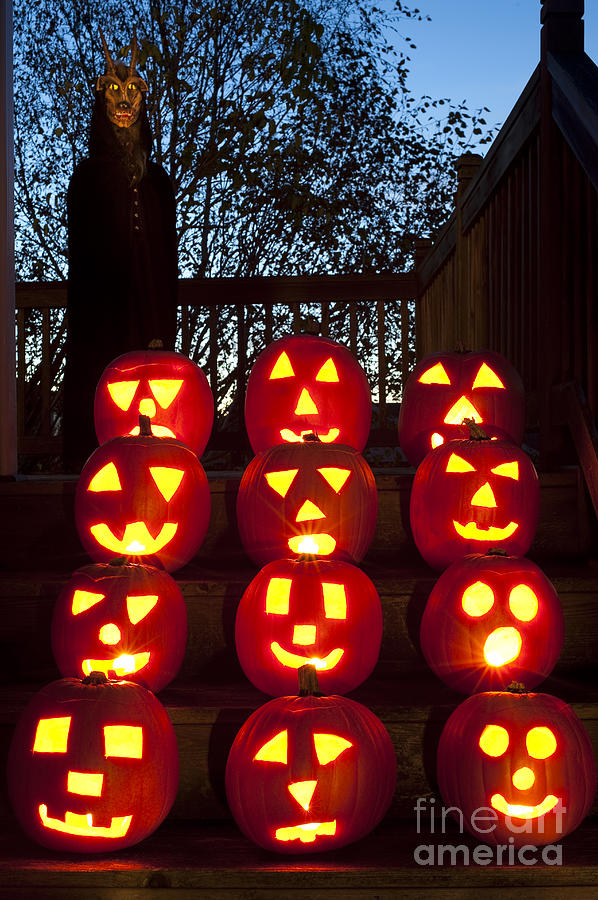 Lit Pumpkins with Demon on Halloween #1 Photograph by Jim Corwin