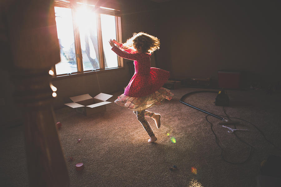 Little Girl Dancing in A sunny Room Photograph by Annie Otzen