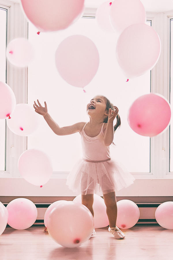 Little girl in a pink world Photograph by Lise Gagne