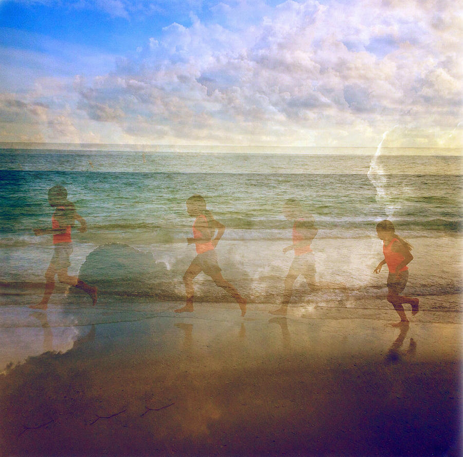 Beach Photograph - Little Girl Running On The Beach by Skip Nall