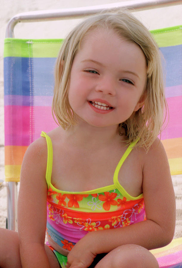 Summer Photograph - Little Girl Smiling Sitting In A Beach by Jill Wachter