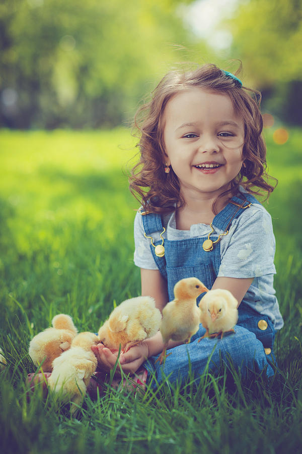 Little girl with chickens Photograph by ArtMarie