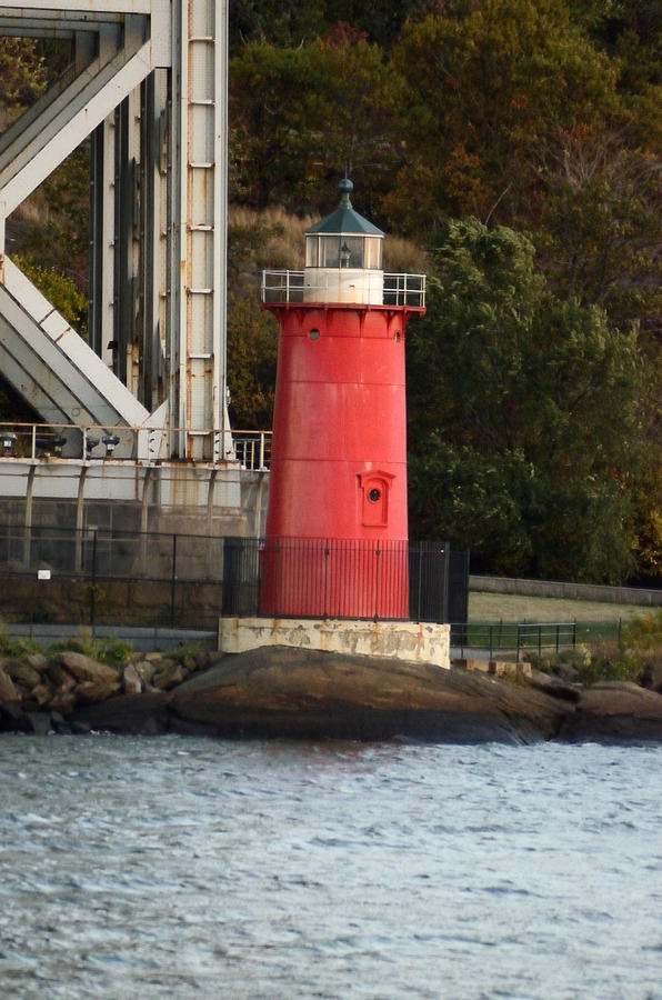 Little Red Lighthouse Next to The Great Grey Bridge Photograph by Tom Wurl