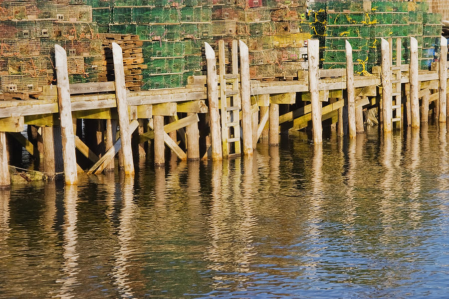 Rope Photograph - Lobster Traps stacked On Pier On Coast Of Maine by Keith Webber Jr