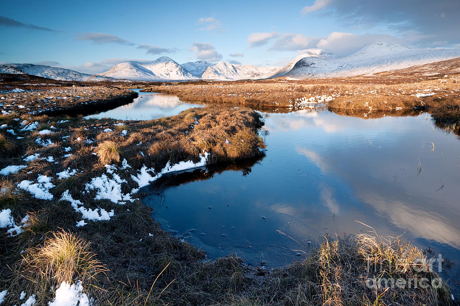 Loch in the Scottish highlands with mountain range reflected Photograph by Matteo Colombo
