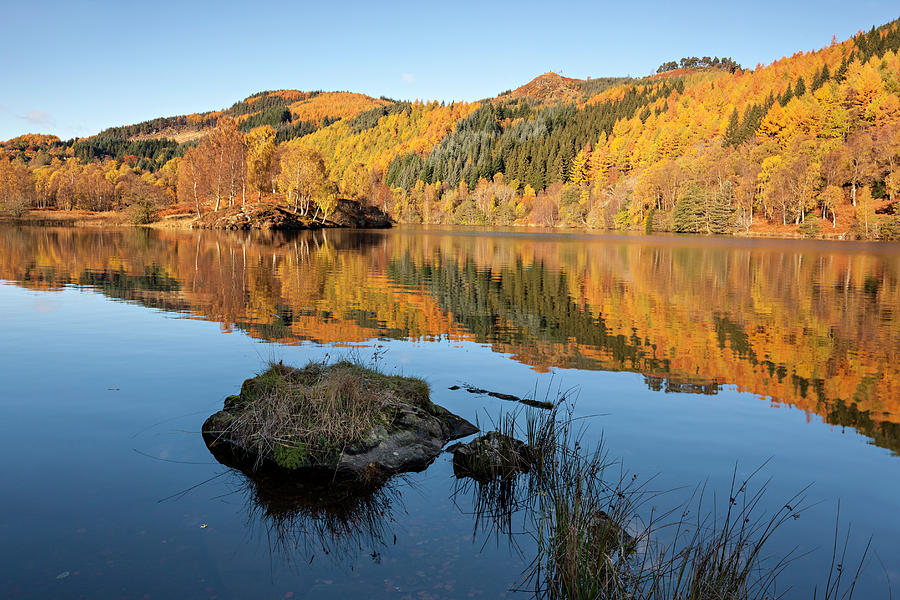 Loch With Reflections Of Autumn Trees Photograph by Simon Butterworth