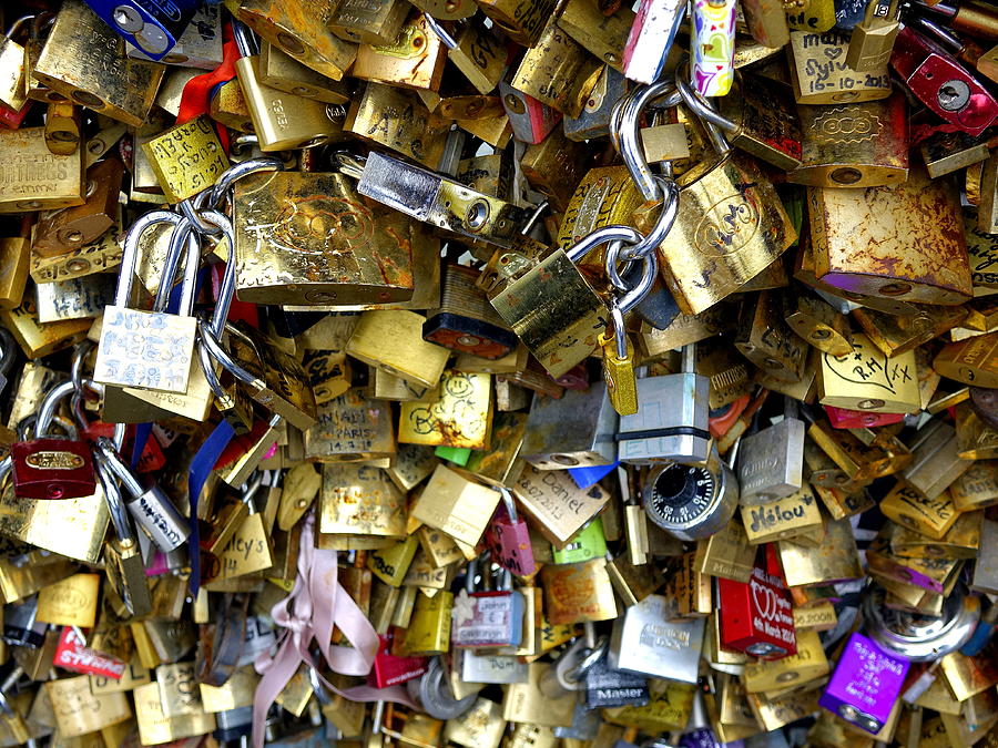 Locks That Are Attached To The Lovers Bridge In Paris france Photograph ...