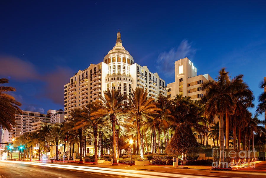 Loews and St. Moritz Hotel on Collins Avenue at Dawn - Miami Beach Florida Photograph by Silvio Ligutti