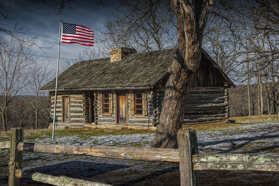 Log Cabin Outpost in Missouri with American Flag Photograph by Randall Nyhof