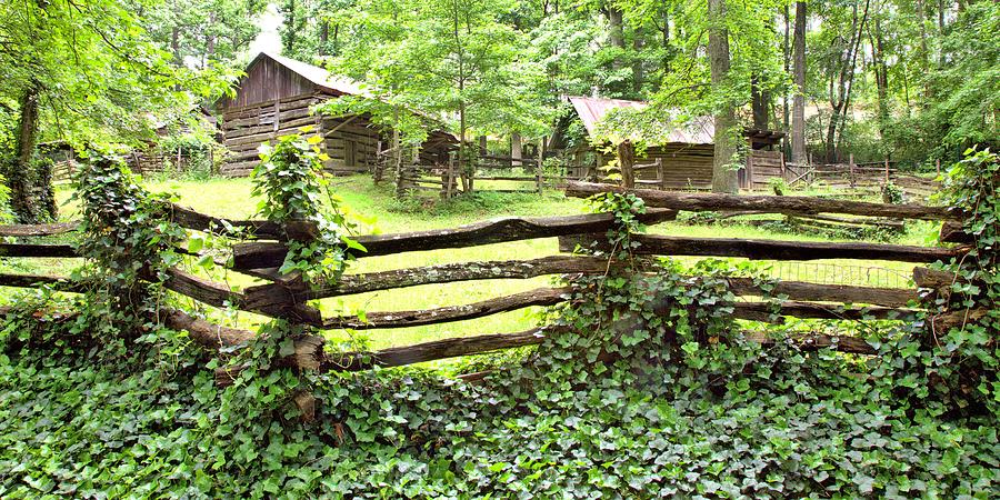 Log Cabins and Splitrail Fence Photograph by Gordon Elwell