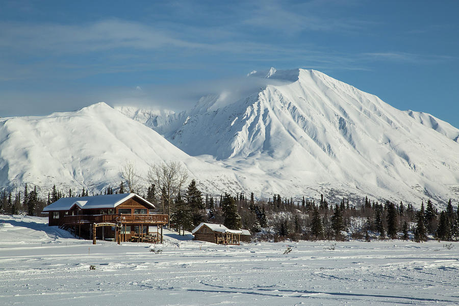 Log Cabins On Frozen Lake Shore Photograph by Matt Andrew