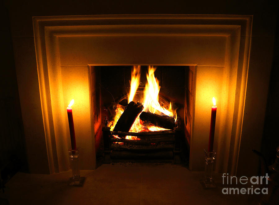 Christmas Photograph - Log fire and candles at Christmas by Rosemary Calvert