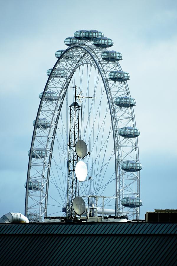 London Eye Framing Antennae Photograph by Richard Henne
