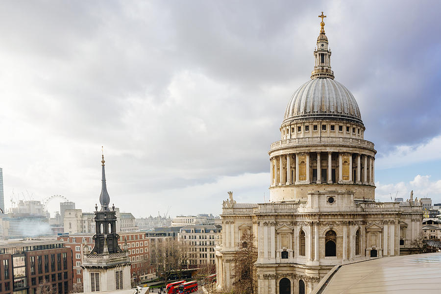 London skyline with dome of St Pauls cathedral on a cloudy day Photograph by Alexander Spatari