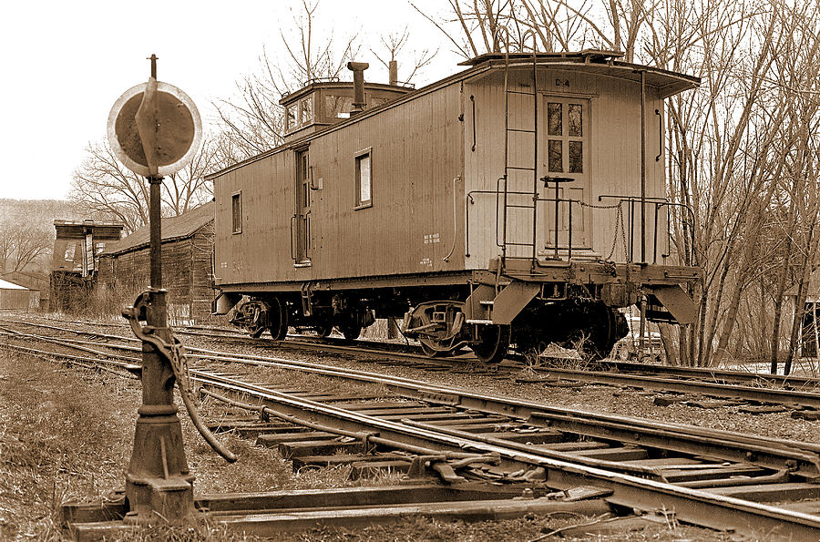 Lone Caboose Photograph by Mike Flynn