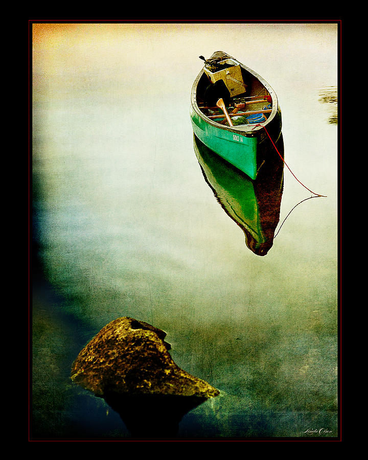 Lone Canoe Photograph by Linda Olsen