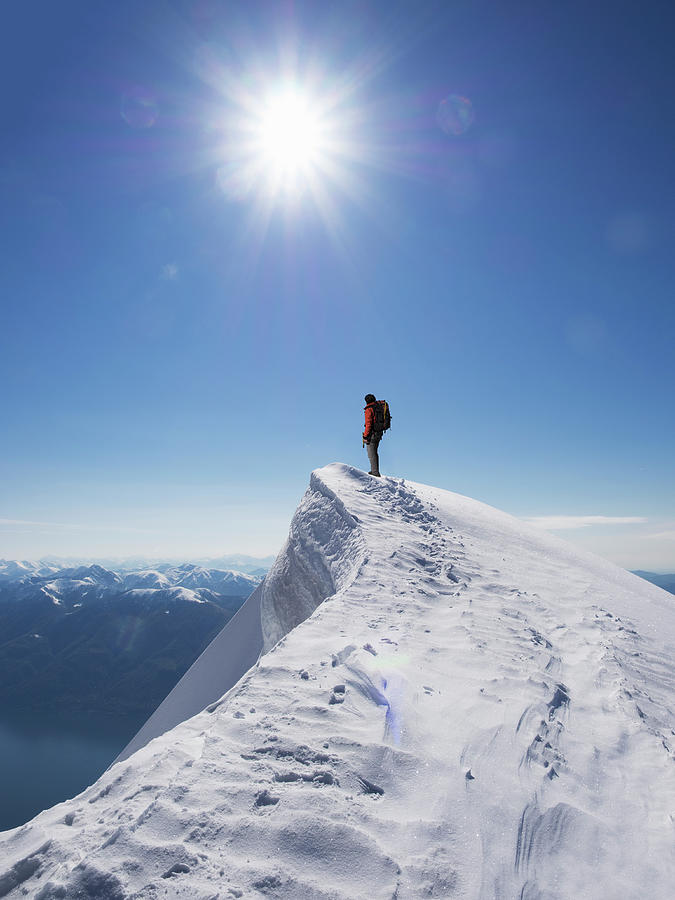 Lone Climber On The Top Of A  Mountain Photograph by Buena Vista Images