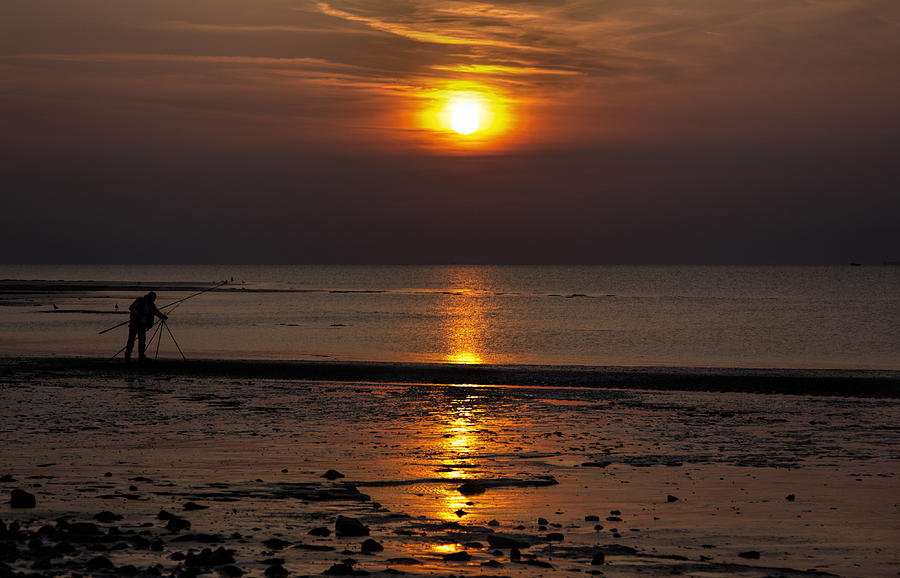 Lone fisherman Photograph by Thanet Photos - Fine Art America