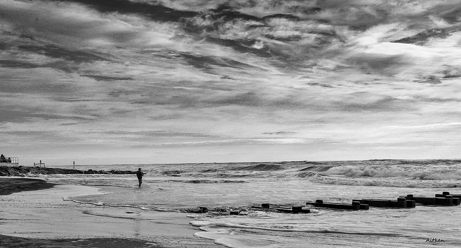 Lone Fishermen Photograph by Charles Aitken