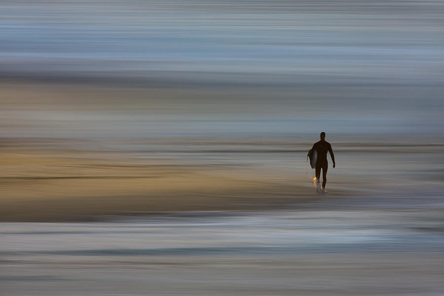 Lone Surfing Walking A Surreal Shoreline Photograph by David Orias