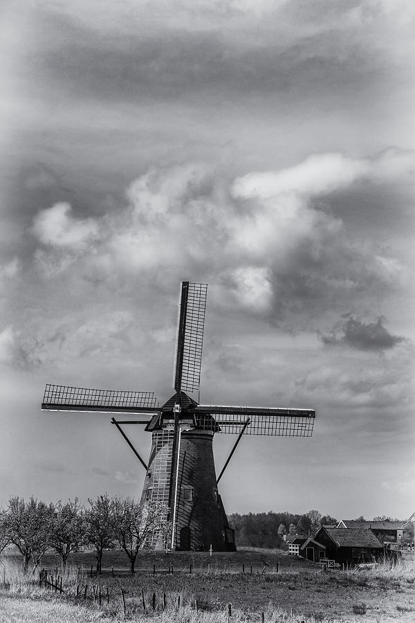 Lone windmill at Kinderdijk Holland Photograph by James Bethanis
