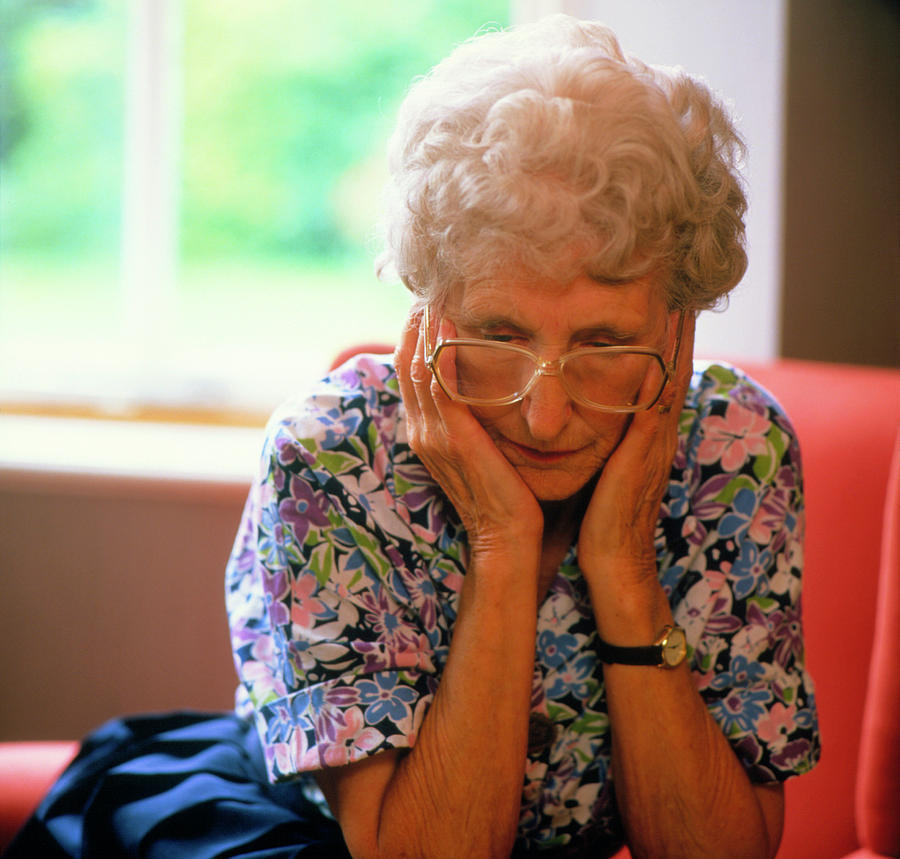 Loneliness: Elderly Woman Clasping Face In Hands Photograph by Sheila Terry/science Photo Library