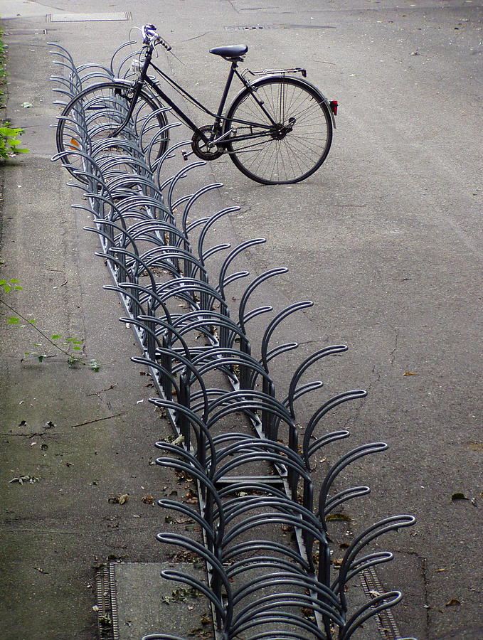 Lonely bike at bicycle rack Photograph by Matthias Hauser
