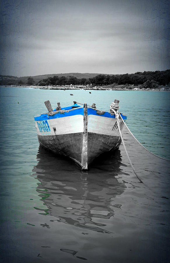 Lonely boat Photograph by Rumiana Nikolova
