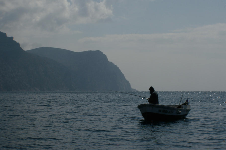 Lonely Fisherman Photograph by Jon Emery