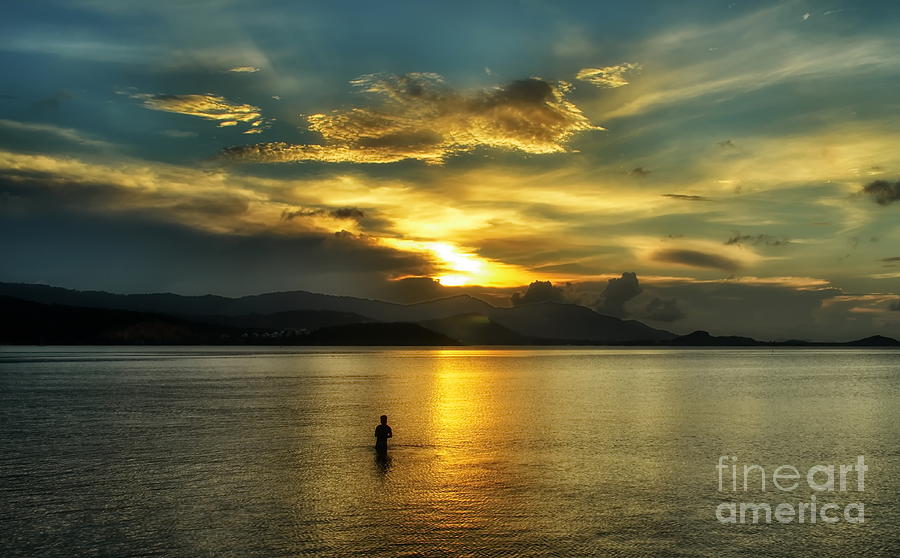 Sunset Photograph - Lonely Fisherman by Michelle Meenawong