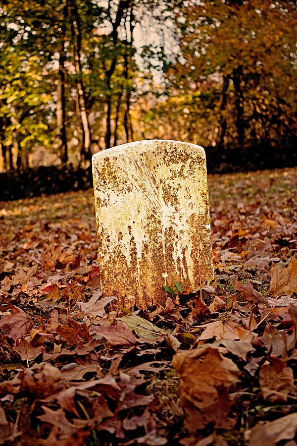 Lonely headstone in autumn Photograph by Michael Porchik