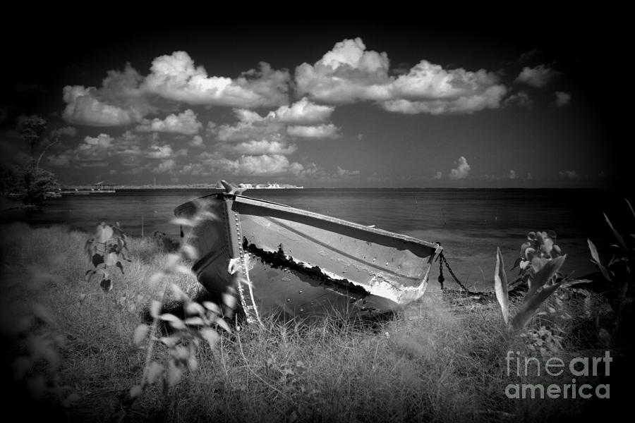 Black And White Photograph - Lonely Old Boat by Dione Scotland Rivero