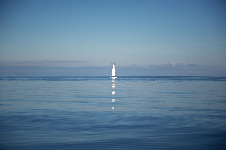 Lonely Sailboat Photograph by Photography By Giovanni Ferrari