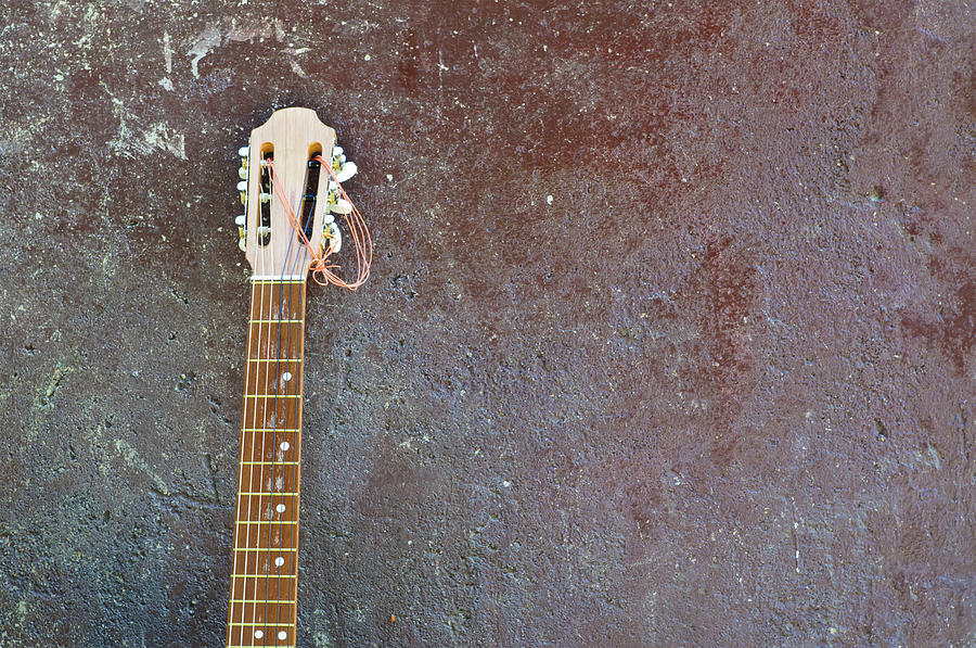 Lonesome Guitar Leaning On Wall Photograph by Mac99