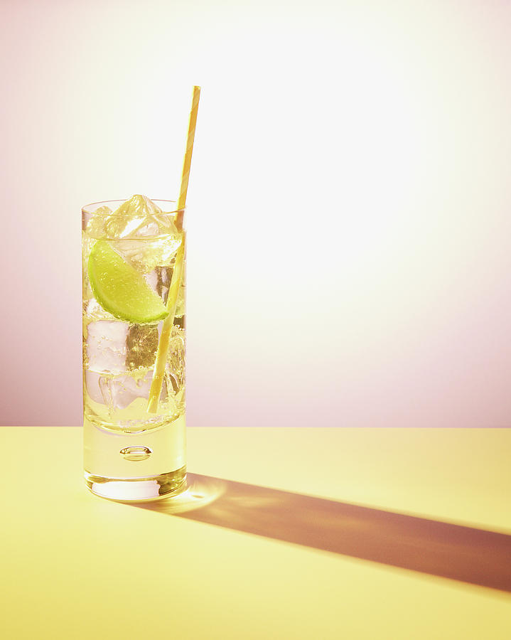 Long Drink In Glass With Lime And Straw Photograph by Felicity Mccabe Long Drink In Glass With Lime And Straw Photograph by Felicity Mccabe