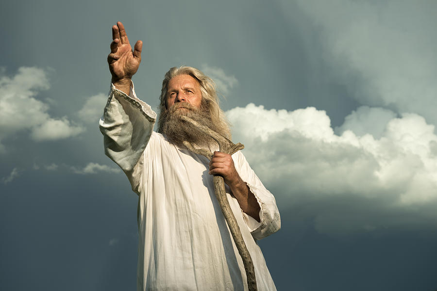 Long-haired Prophet Gesturing In Front Of Dramatic Sky Photograph by Kemter