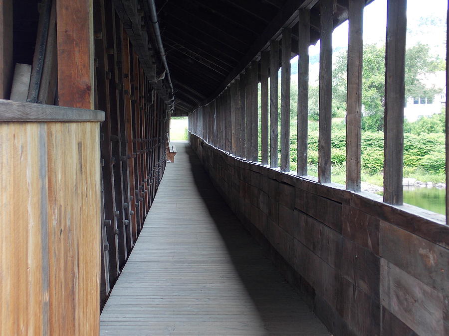 Long walkway in Covered Bridge Photograph by Catherine Gagne